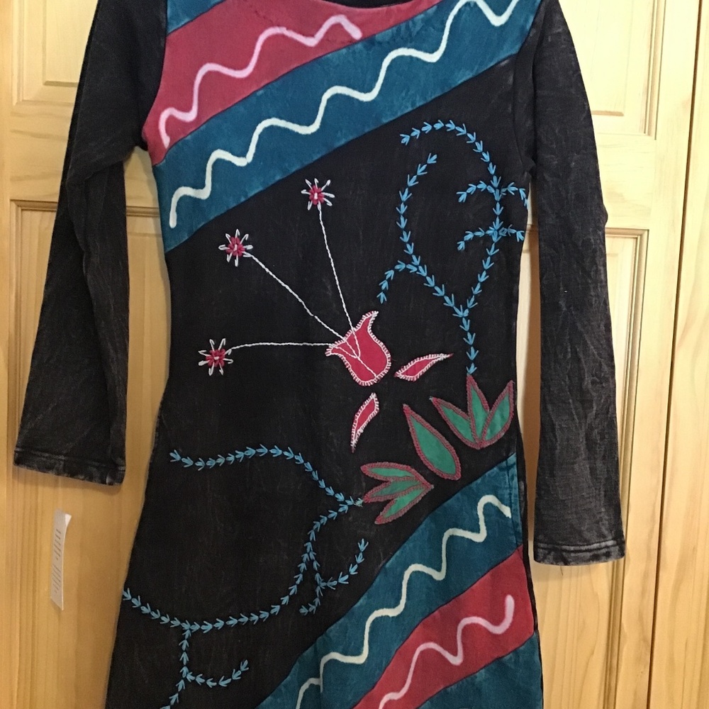 Small hand crafted dress from Nepal